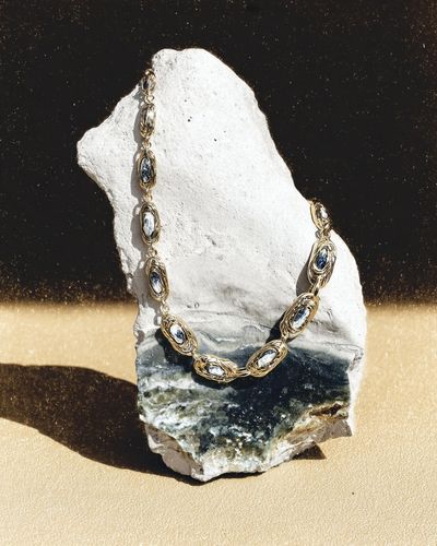 Gold Necklace Still Life Poster. poster