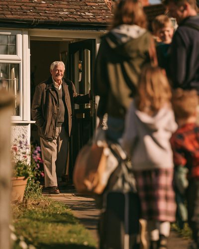 Smiling Man at Door Photography Poster. poster
