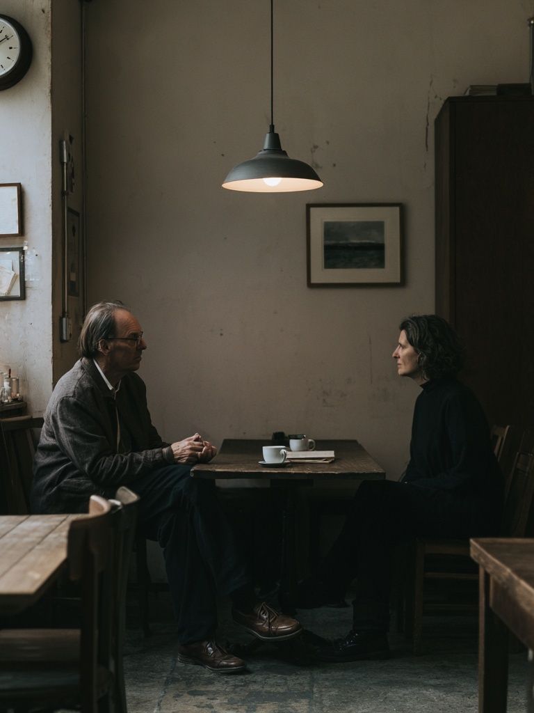 Quiet Café Conversation Photography Poster. poster detail