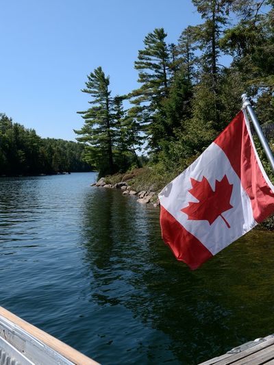 Canadian Lakeside Flag Photography Poster.