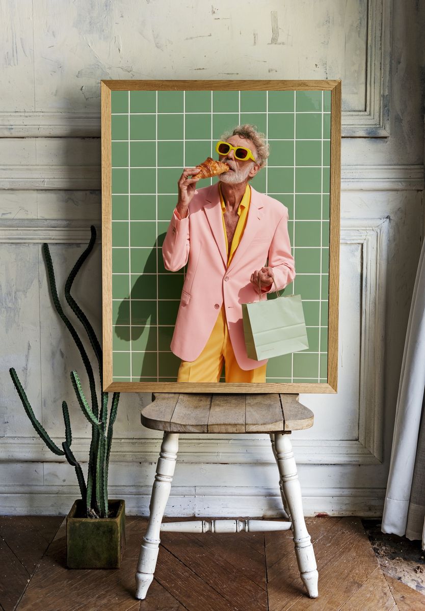 Stylish Man with Croissant Photography Poster. room preview