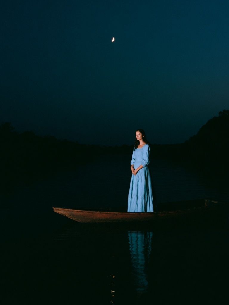 Moonlit Boat Portrait Photography Poster. poster detail