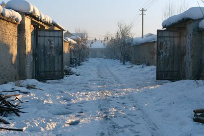 Snowy Village Lane Photography Poster. poster