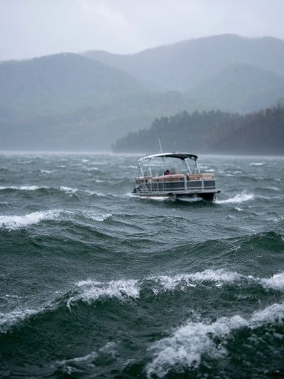 Stormy Lake Boat Photography Poster.