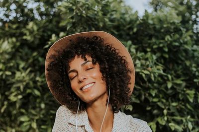 Beautiful woman listening music botanical. poster print