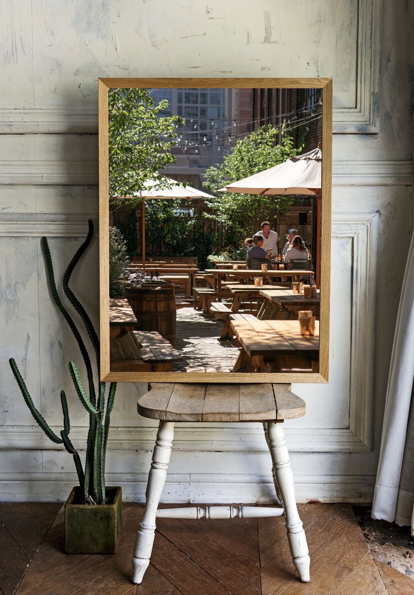 Sunlit Courtyard Cafe Photography Poster. — room view 1