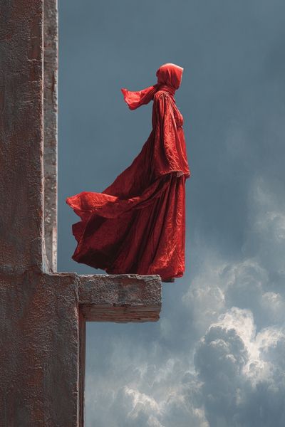 Red Cloaked Figure Surrealism Print. poster