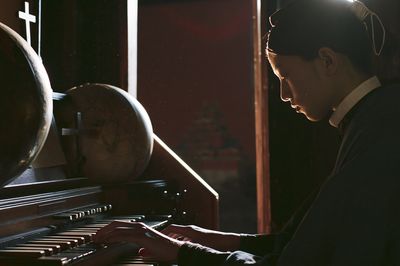 Pianist in Candlelight Photography Poster. poster