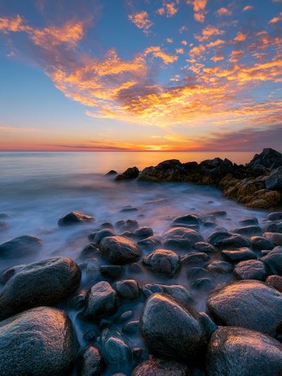 Sunset Rocky Shoreline Photography Poster. poster