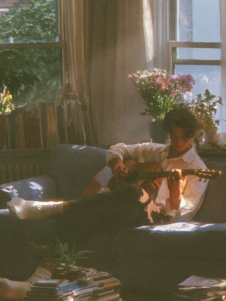 Sunlit Guitar Lounge Photography Poster. poster detail