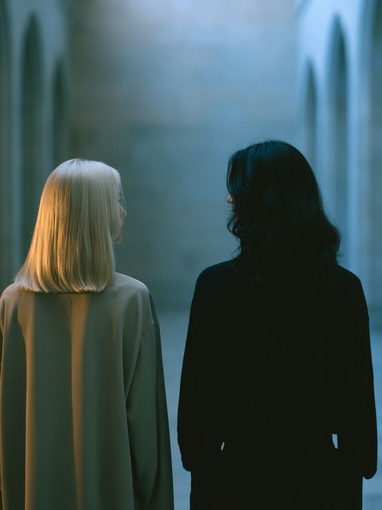 Two Figures in Blue Corridor Poster. poster — photography art