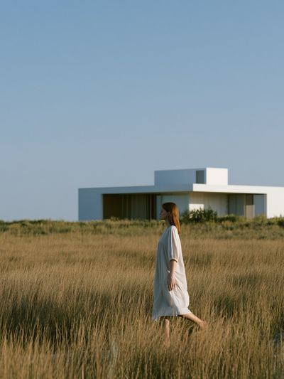 Coastal House in Grassland Photography Poster.