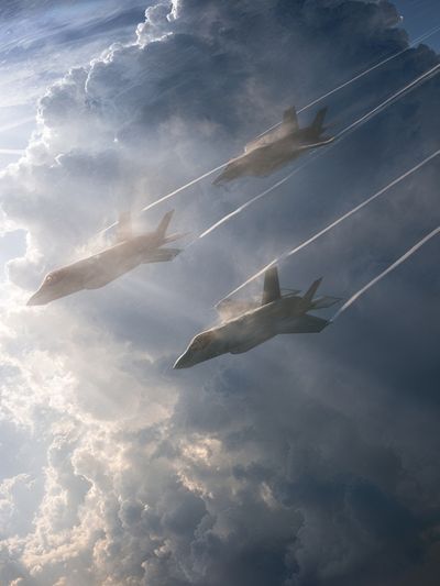 Stealth Jets in Storm Clouds Poster. poster
