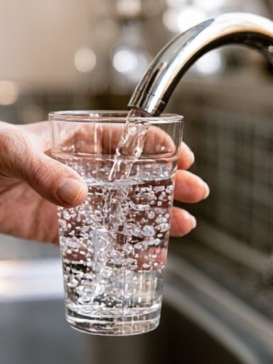 Filling Glass at Sink Photography Poster. poster — photography art