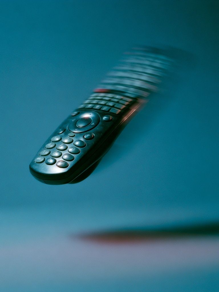 Floating Remote Control Photography Poster. poster — photography art