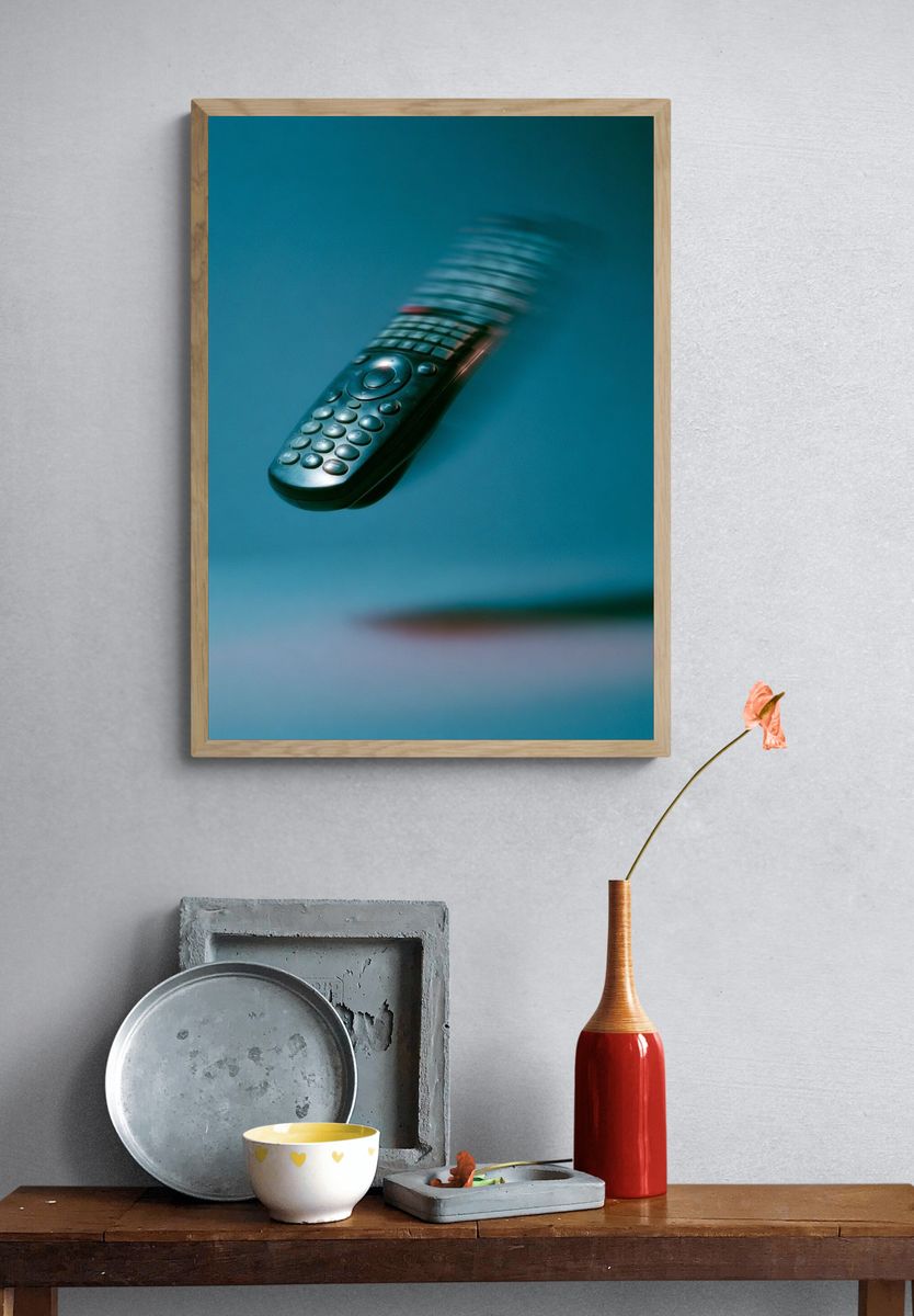 Floating Remote Control Photography Poster. — room view 3