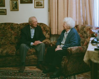 Elderly Couple in Living Room Photography Poster.