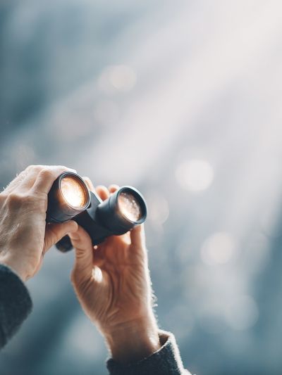 Hands with Binoculars Photography Poster. poster print