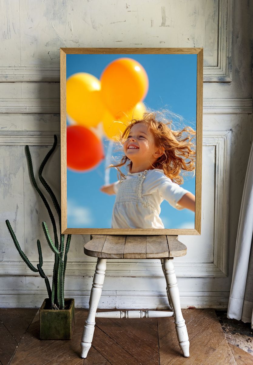 Joyful Child with Balloons Photography Poster. — room view 1