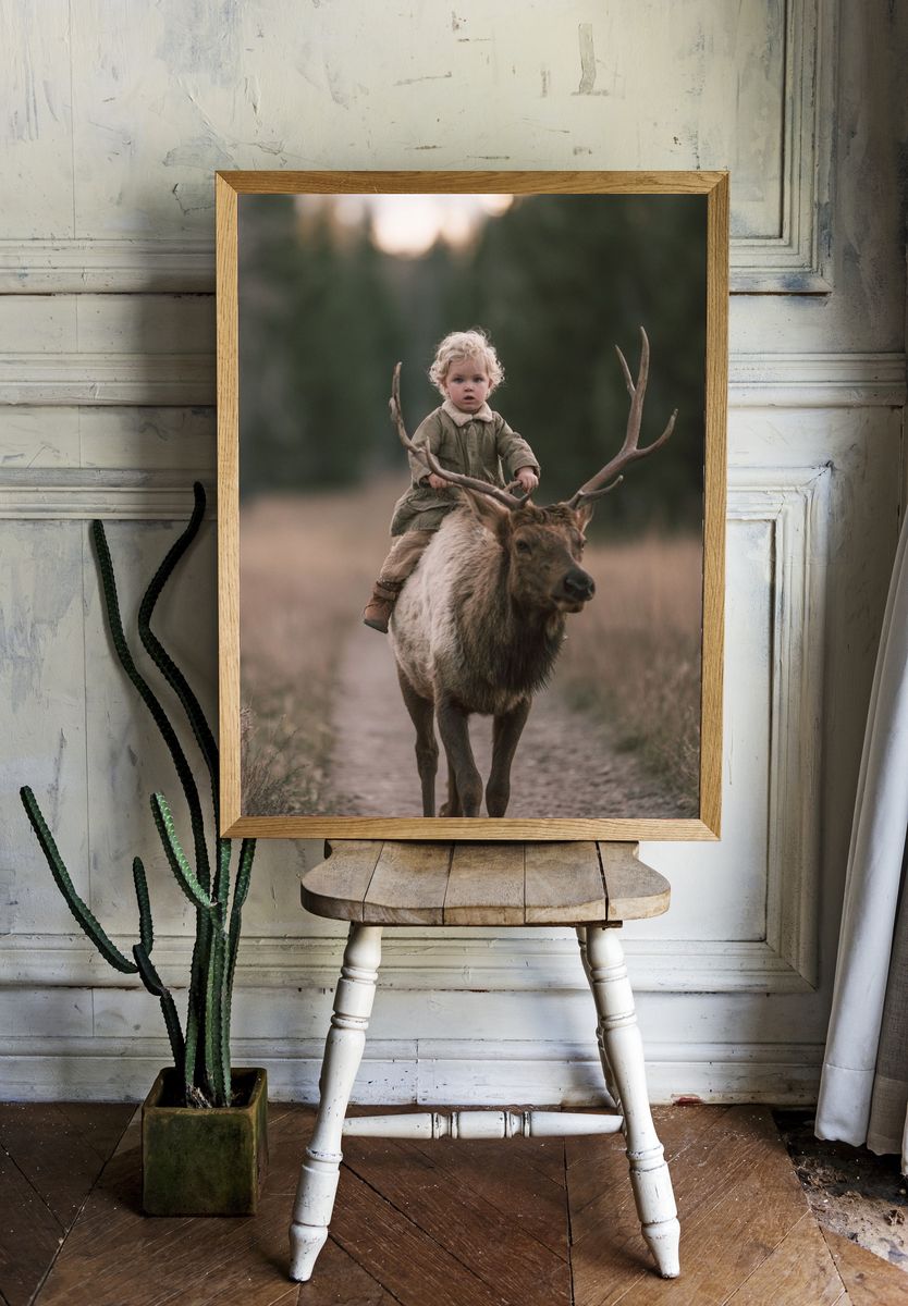 Child Riding Elk Photography Poster. room preview