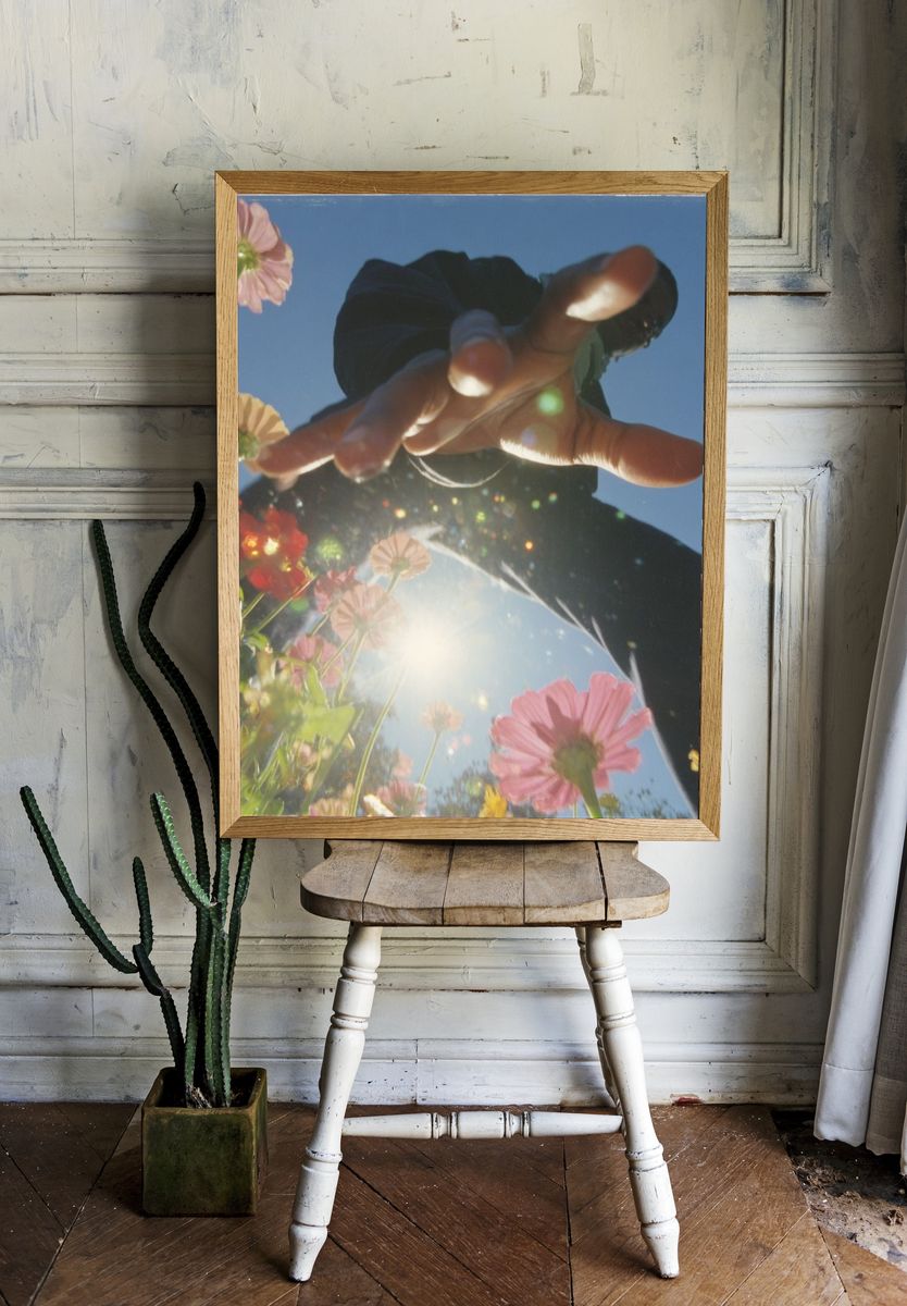Sunlit Flowers and Hand Photography Poster. — room view 1