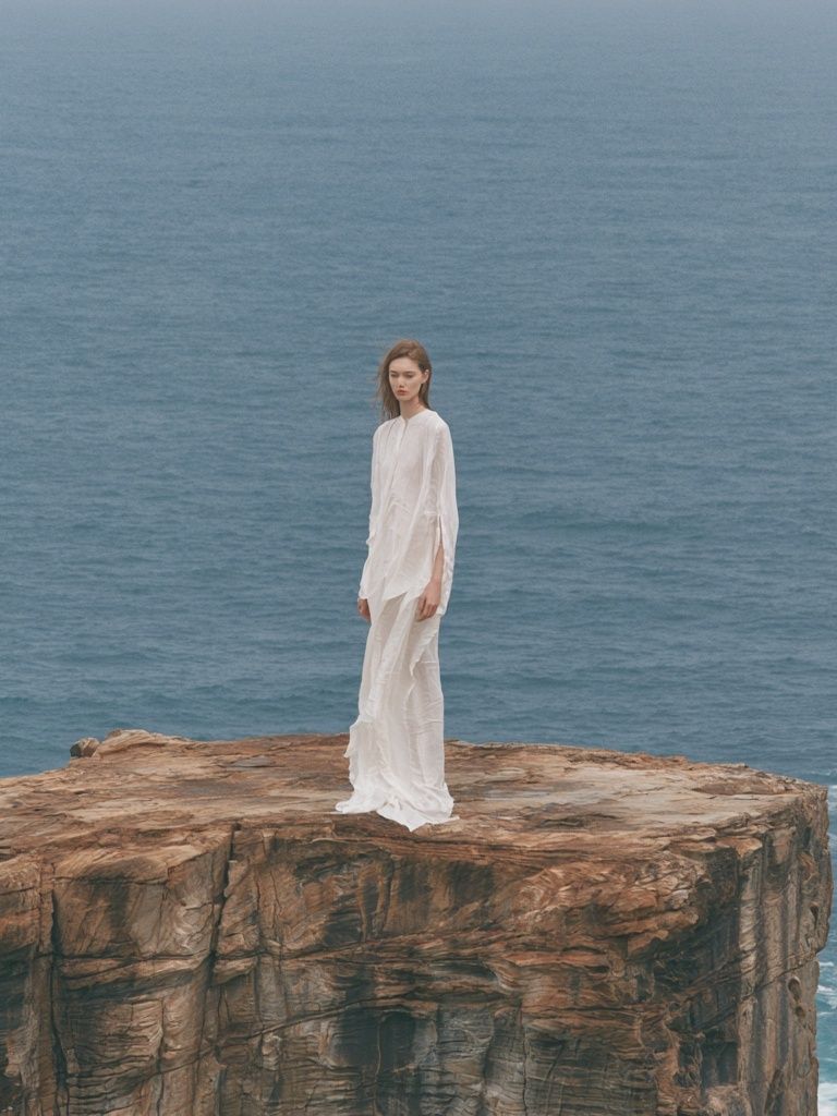 Cliffside Figure Photography Print. poster detail