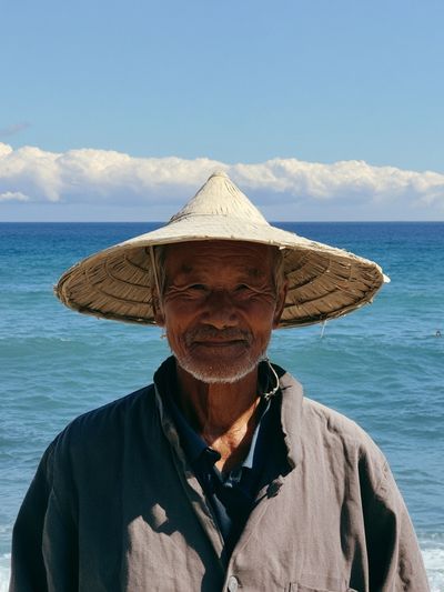 Fisherman by the Sea Photography Poster. poster