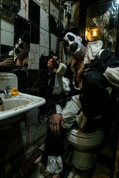 Creepy Clown Bathroom Photography Poster. poster