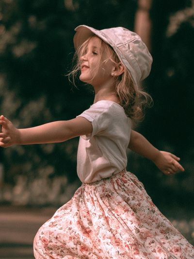 Joyful Child in Garden Photography Poster.