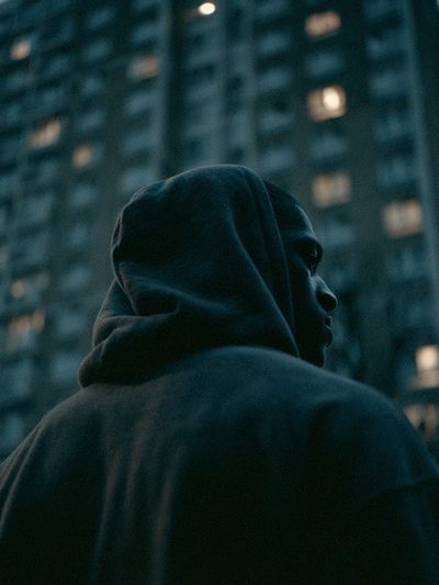 Hooded Figure at Dusk Poster. poster