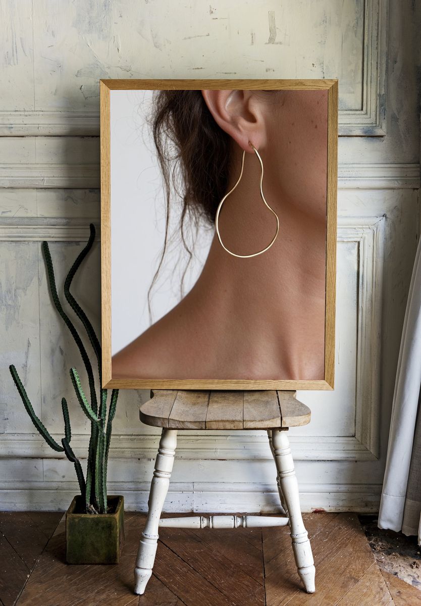 Gold Hoop Earring Portrait Print. room preview