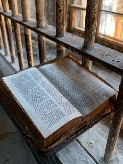 Open Bible in Sunlight Photography Poster.