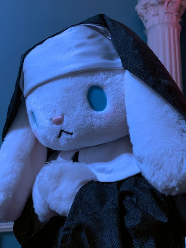 Plush Bunny Nun Portrait Print. poster detail