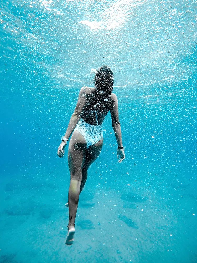 Woman swimming water. poster — photography art