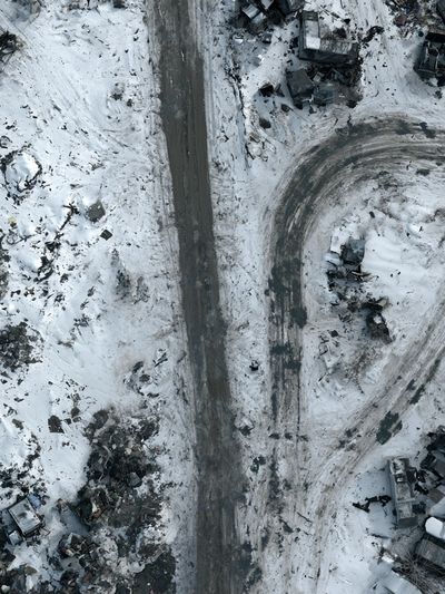 Snowy Aerial Wreckage Photography Poster.