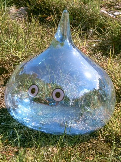 Glass Slime in Grass Photography Poster.