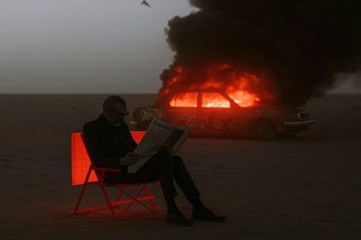 Burning Car by the Sea Photography Poster. poster print