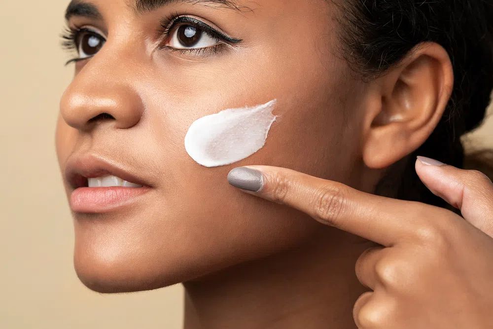 Closeup beautiful woman using moisturizing. poster — photography art