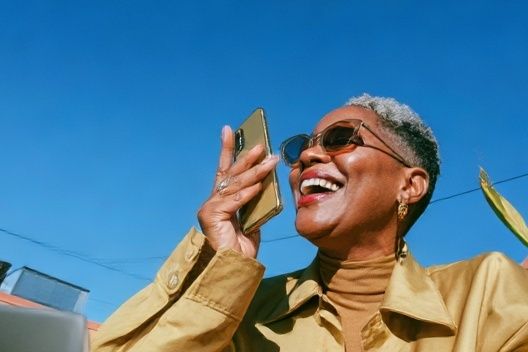 Joyful Woman in Sunlight Photography Poster. poster detail