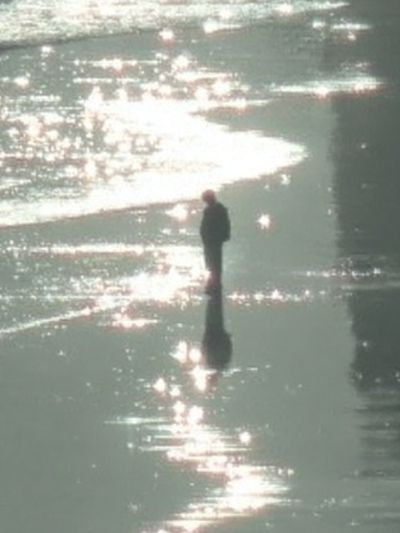 Solitary Figure on Water Photography Poster. poster
