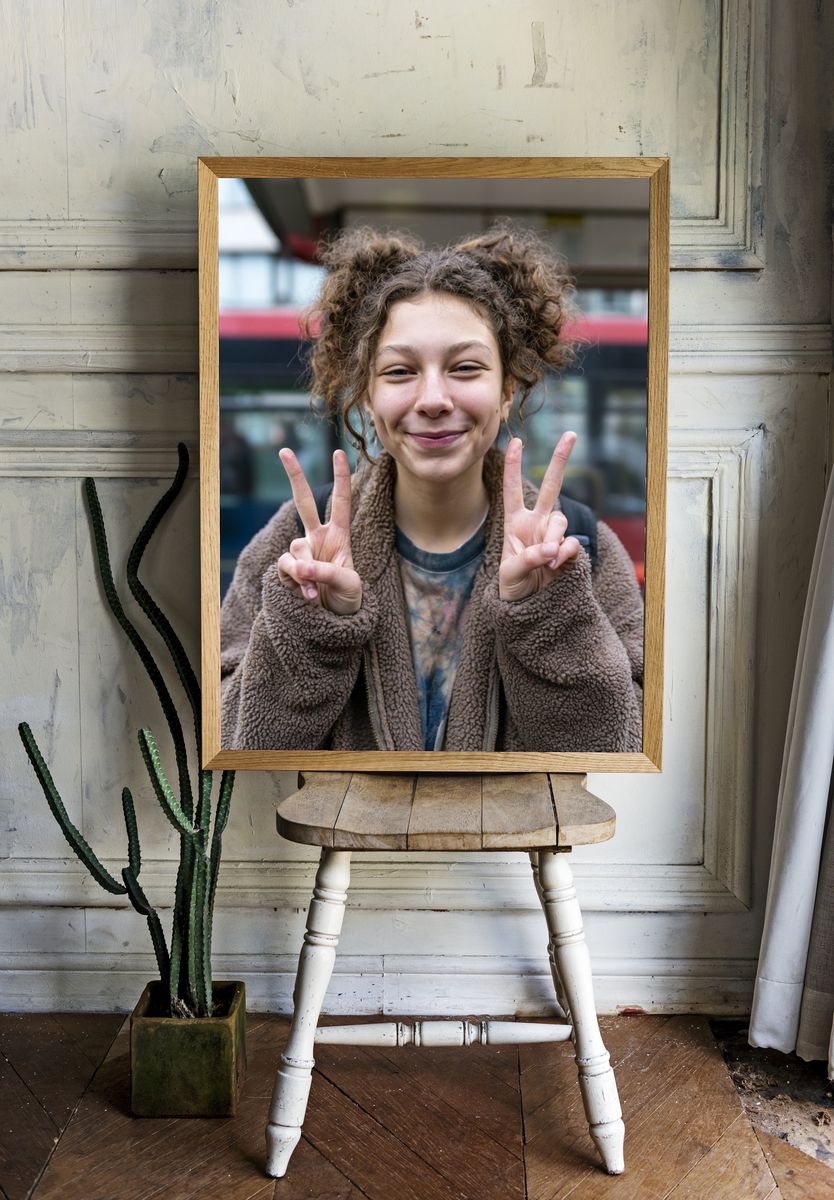 Smiling Girl Peace Sign Portrait Print. room preview