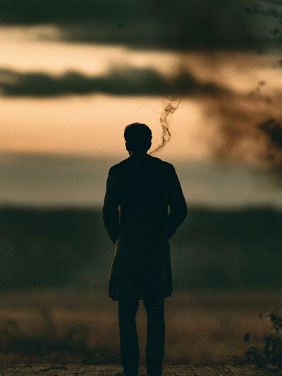 Solitary Figure at Sunset Photography Poster. poster