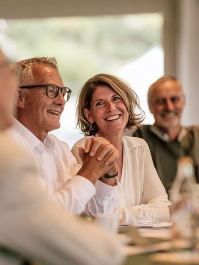 Smiling Friends at Dinner Photography Poster. poster