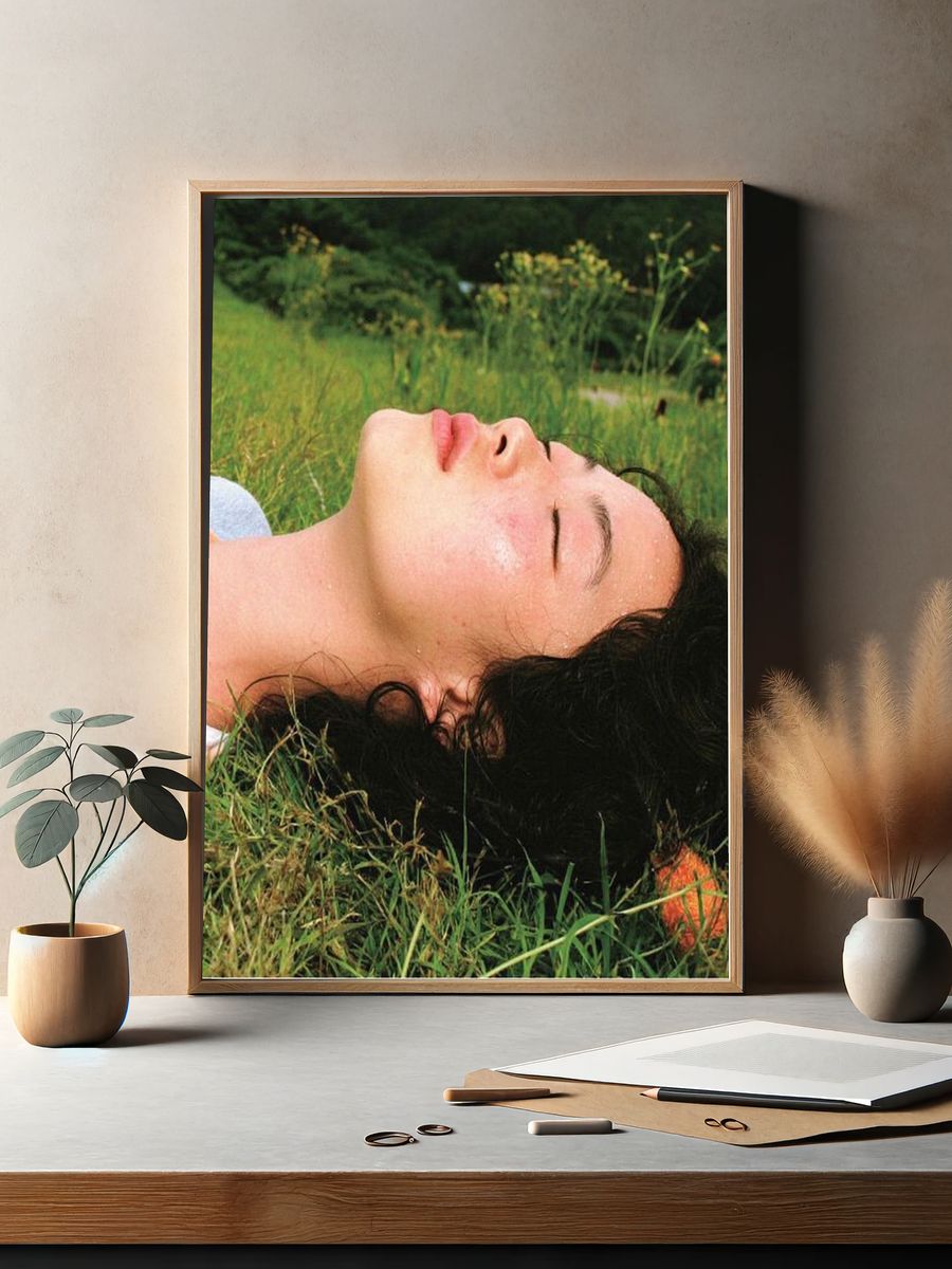 Woman Resting in Grass Photography Poster. — room view 2