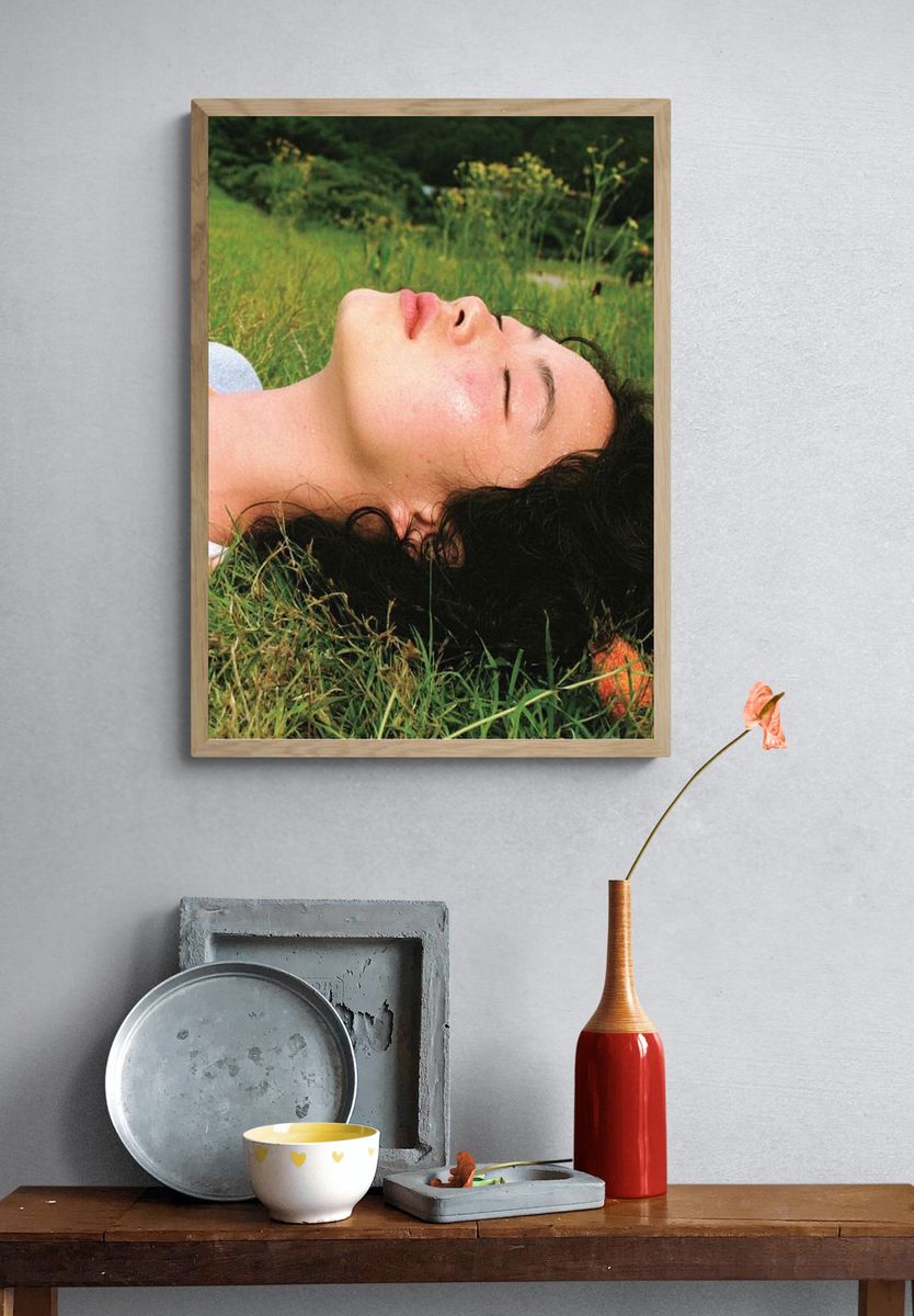 Woman Resting in Grass Photography Poster. — room view 3