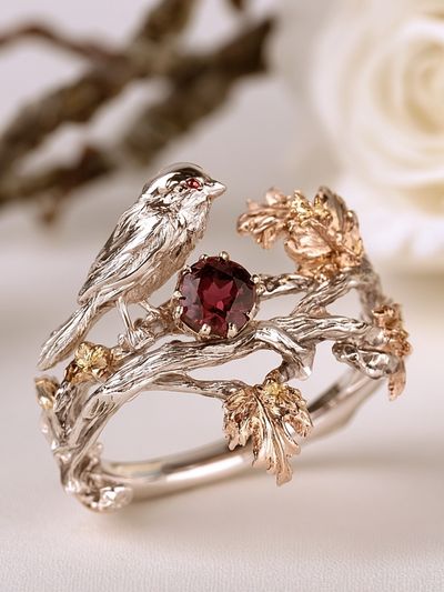 Bird and Garnet Jewelry Photography Poster. poster