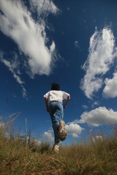 Runner Under Blue Sky Photography Poster. poster print