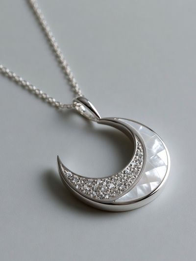 Silver Crescent Necklace Photography Poster. poster