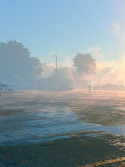 Misty Parking Lot Sunrise Poster.
