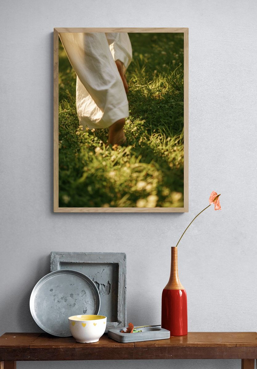 Barefoot Walk in Sunlit Grass Photography Poster. — room view 3